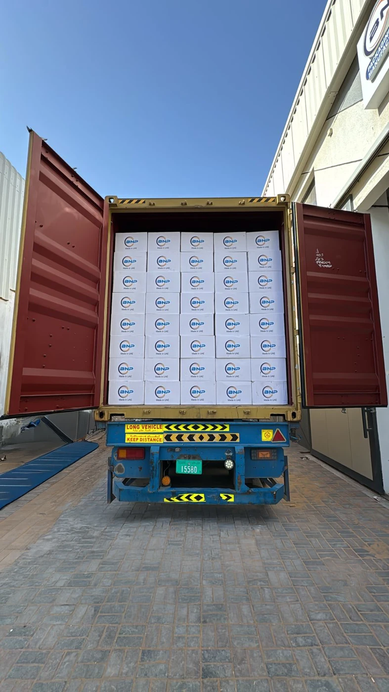 Loaded shipping container of Basma Nour cartons